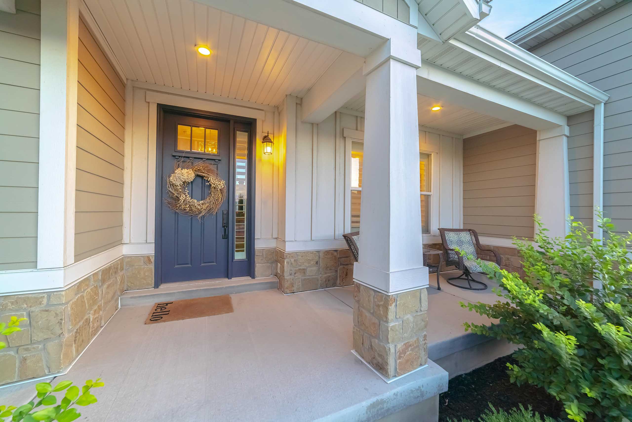 Front And Sidelight Of Home With Front Porch And Wood Siding Exe